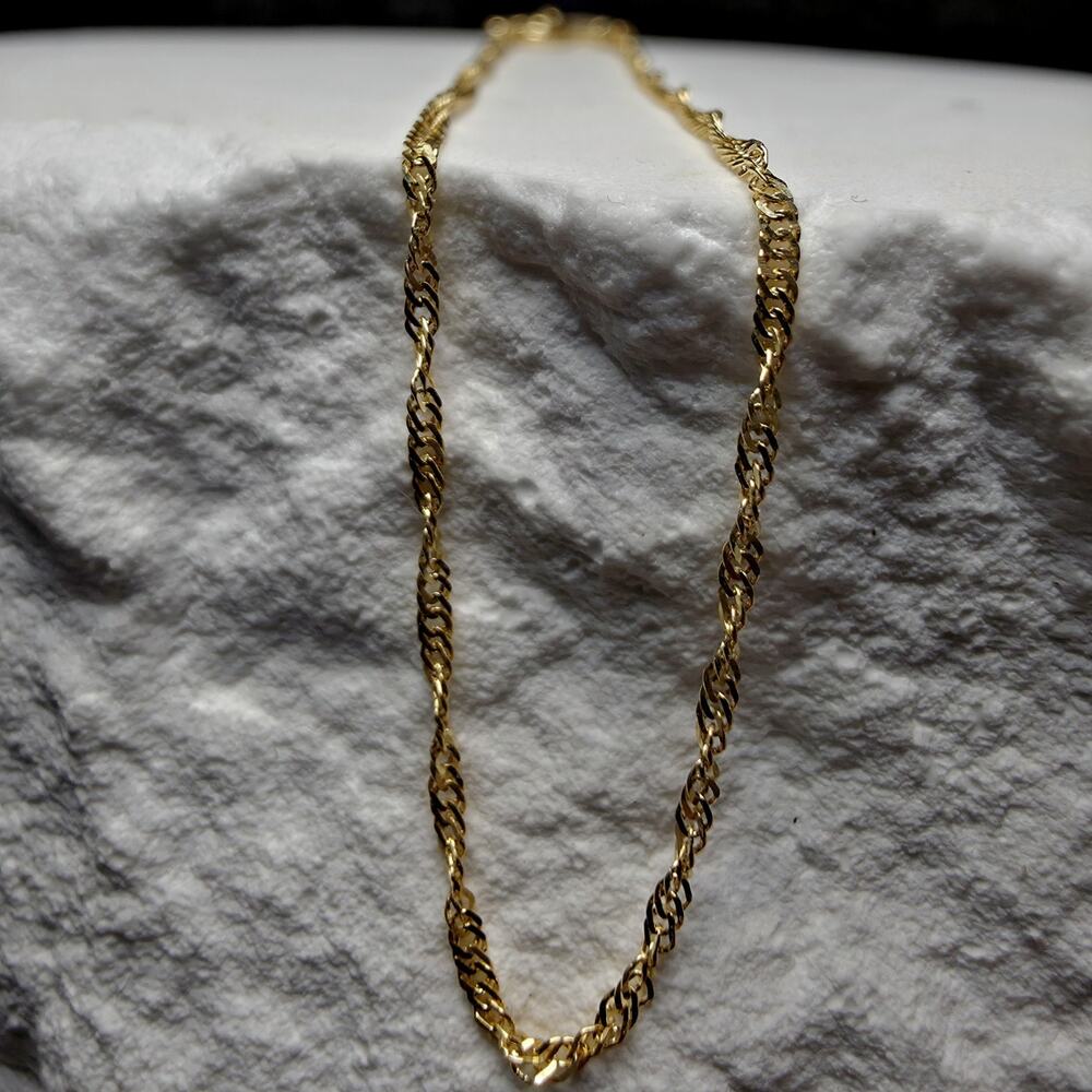 10K Yellow Gold 1.2mm Singapore Bracelet 7"